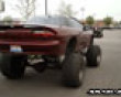 Funny pics tracker: Jacked up camaro picture