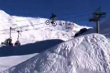 Mountain bike jumps snow hill