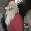 Drunk santa falls off roof