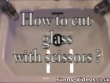 Funny videos : Cutting glass with sissors