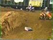Motocross marshal knocked over