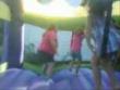Large girl takes out bouncy castle