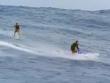 Surfer rides 300-ft tsunami wave