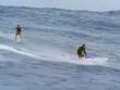 Surfer rides 300-ft tsunami wave