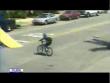 Stupid videos: Idiot tries to get on roof with bike