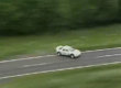 Rally car crashes into flames
